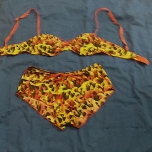 Women's flame lingerie bra top and booty shorts. Top size 36B bottoms medium 10